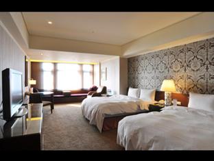 古华花园饭店精致双人床图片