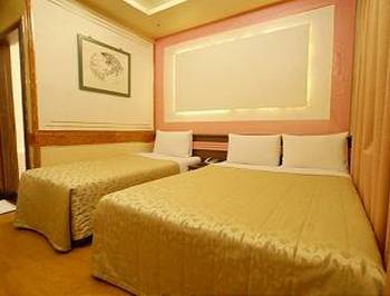 金国际旅馆精致三人房图片